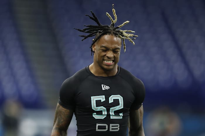 Mar 1, 2020; Indianapolis, Indiana, USA; Alabama Crimson Tide defensive back Xavier McKinney (DB52) grimaces in pain after hurting himself running the 40 yard dash during the 2020 NFL Combine at Lucas Oil Stadium.